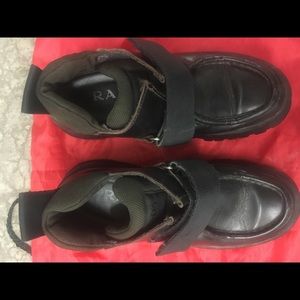 Chocolate and very durable Prada ankle boots.